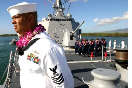 US Navy 031219-N-3228G-003 Sailors man the rails aboard the newly commissioned guided missile destroyer USS Chafee (DDG 90) photo