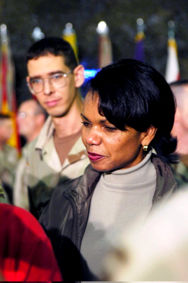 US Navy 031127-A-7275M-004 Dr. Condoleezza Rice, National Security Advisor, speaks with 1st Armored Division soldiers during a Thanksgiving