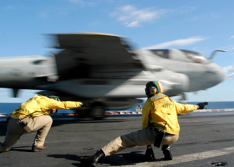 US Navy 031127-N-3986D-001 Aircraft shooters signal an EA-6B Prowler assigned to the Patriots of Electronic Attack Squadron One Four Zero (VAQ-140)