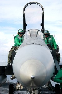US Navy 031126-N-3986D-002 Maintenance personnel assigned to the Knighthawks of Strike Fighter Squadron One Three Six (VFA-136)