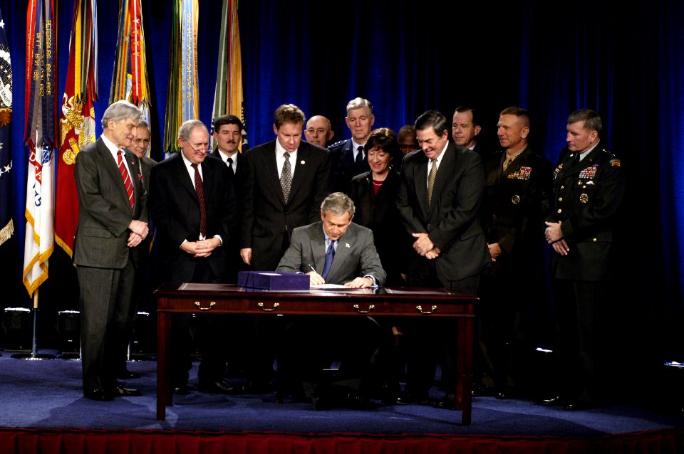 US Navy 031124-D-2987S-056 President George W. Bush signs the Defense Authorization Bill at the Pentagon on Nov. 24, 2003