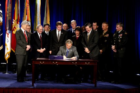 US Navy 031124-D-2987S-056 President George W. Bush signs the Defense Authorization Bill at the Pentagon on Nov. 24, 2003