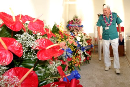 US Navy 031207-N-3228G-004 Pearl Harbor survivor Bill Cope of the Arizona Memorial Museum Association looks for his organization's wreath before the 62nd Commemoration of the Dec. 7, 1941 attack on Pearl Harbor