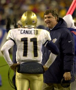 US Navy 031206-N-9693M-512 Navy head coach Paul Johnson talks to quarterback Craig Candeto between plays during the 104th Army Navy Game photo