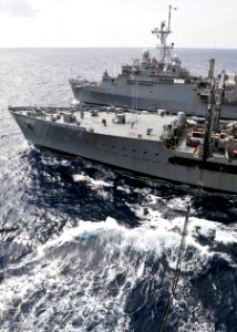 US Navy 101018-N-9950J-372 The Military Sealift Command fleet replenishment oiler USNS Pecos (T-AO 197) conducts an underway replenishment with the