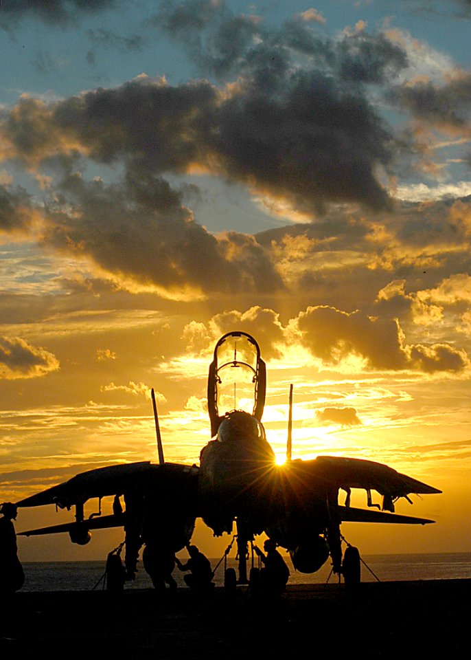 US Navy 031124-N-8213G-002 An F-14B Tomcat assigned to Carrier Air Wing Seven (CVW-7) is inspected aboard USS George Washington (CVN 73) following flight operations