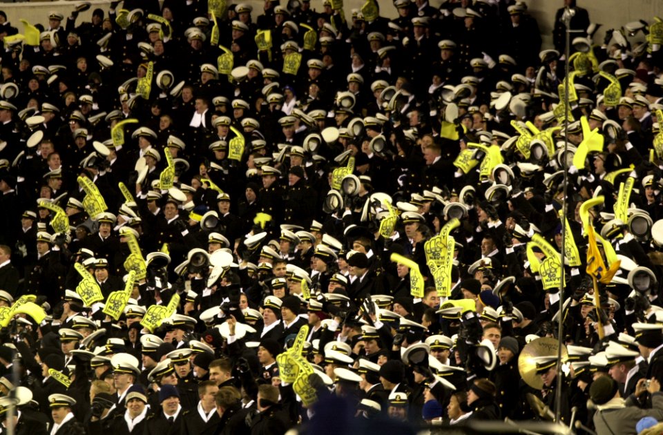 US Navy 031206-N-9693M-513 The U.S. Naval Academy Brigade of Midshipmen cheers for their football team during the 104th Army Navy Game