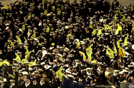 US Navy 031206-N-9693M-513 The U.S. Naval Academy Brigade of Midshipmen cheers for their football team during the 104th Army Navy Game