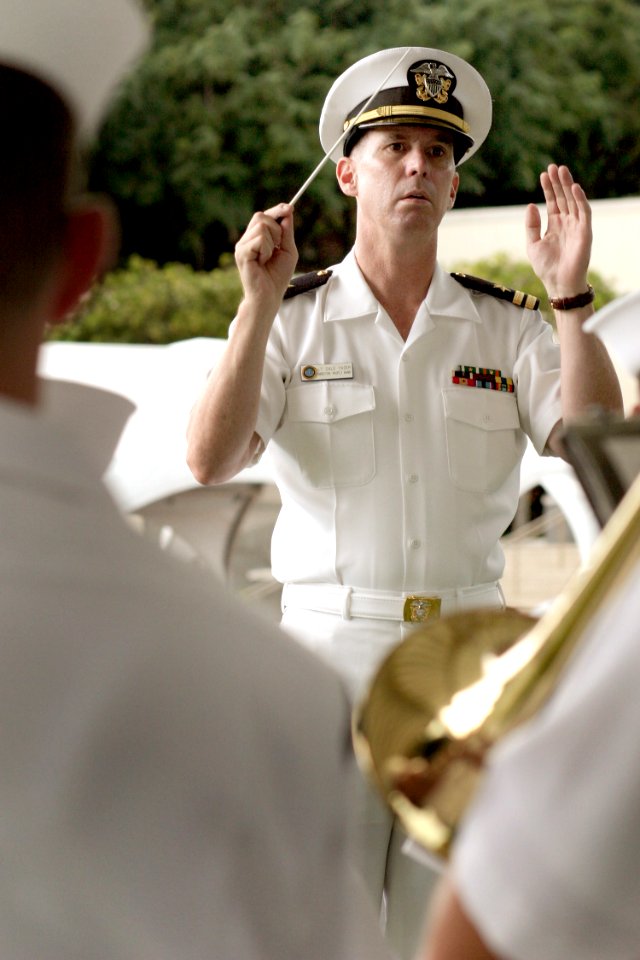 US Navy 031207-N-3228G-044 Director of the Pacific Fleet Band, Lt. Dale Yeager leads his band during the 62nd Commemoration of the Dec. 7, 1941 attack on Pearl Harbor