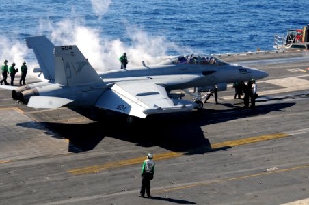 US Navy 110129-N-7004H-071 An EA-18G Growler prepares to take off from USS George H.W. Bush (CVN 77)