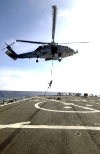 US Navy 031213-N-5319A-014 Gunners Mate First Class Casey Rodgers, Lt. Cmdr. Scott Kraft and Boatswain's Mate Senior Chief Tony Diaz assigned to Explosive Ordnance Disposal Mobile Unit Six (EODMU 6)