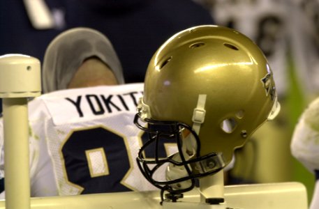 US Navy 031206-N-9693M-509 A Navy helmet hangs on a warming post during the 104th Army Navy game photo