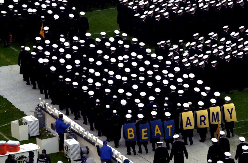 US Navy 031206-N-9693M-001 U.S. Naval Academy's 30th Company marches into the stadium at Lincoln Financial Field