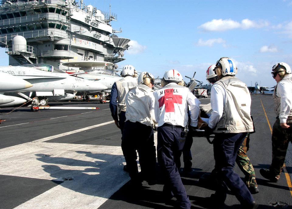 US Navy 040125-N-6278K-002 USS George Washington (CVN 73) provides emergency medical care to an Italian sailor at sea