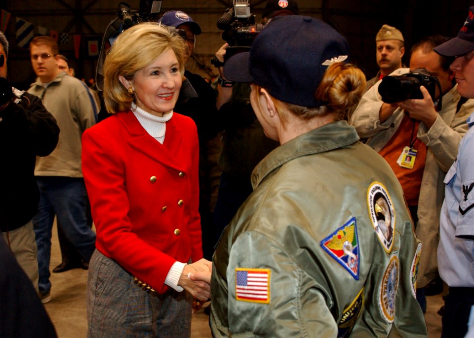 US Navy 040111-N-1328C-511 Chairwoman for the Subcommittee on Military Construction, Senator Kay Bailey Hutchison, R-Texas, shakes hands with one of the many naval reservists and active duty Sailors