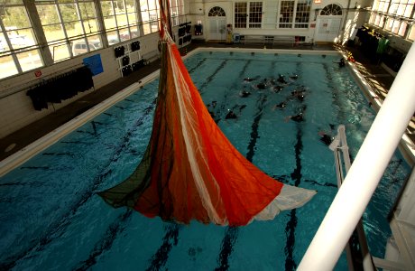 US Navy 031113-N-5862D-067 Students at the Aviation Rescue Swimmer School prepare to undergo a parachute disentanglement exercise