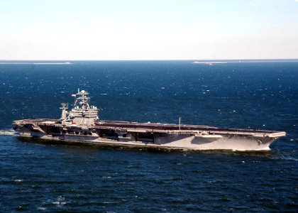 US Navy 040120-N-6278K-001 USS George Washington (CVN 73) sails past the Chesapeake Bay Bridge tunnel into the Atlantic Ocean to start her deployment
