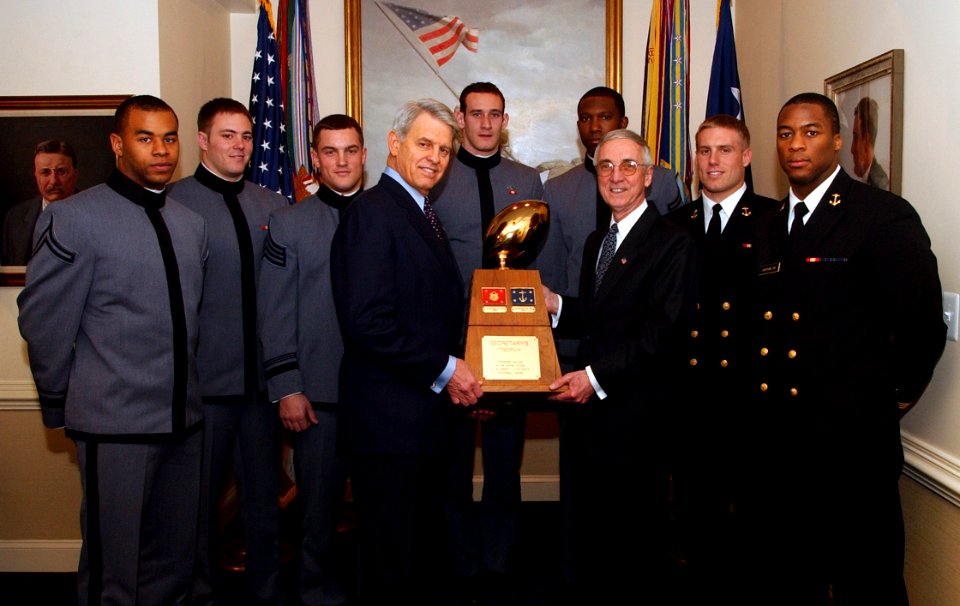 US Navy 040122-N-2568S-001 Cadets from the U.S. Military Academy West Point, and Midshipmen from the U.S. Naval Academy join Secretary of the Navy, the Honorable Gordon R. England