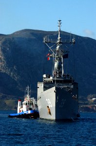 US Navy 031216-N-0780F-030 USS Doyle (FFG 39) is assisted by Greek tugs as she arrives for a brief port visit at Souda Bay