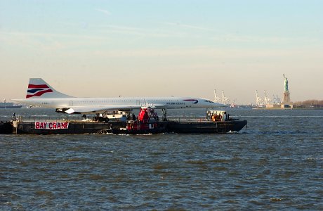 US Navy 032411-C-9409S-001 The British Airways Concorde Jet passes the Statue of Liberty in New York Harbor on its way to the USS Intrepid Air ^ Space Museum
