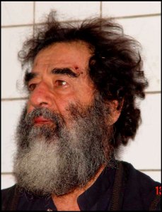 US Navy 031214-D-0000X-001 Former Iraqi leader Saddam Hussein following his capture by soldiers from the 1st Brigade Combat Team, 4th Infantry Division, in Tikrit, Iraq