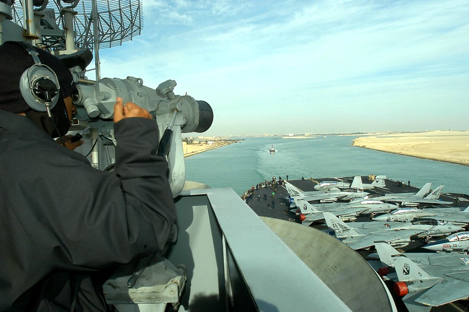 US Navy 040216-N-3986D-032 Seaman John Hull, of Virginia Beach, Va., stands a lookout watch from the signal bridge aboard USS George Washington (CVN 73) while the ship and her embarked Carrier Air Wing Seven (CVW-7) transit thr