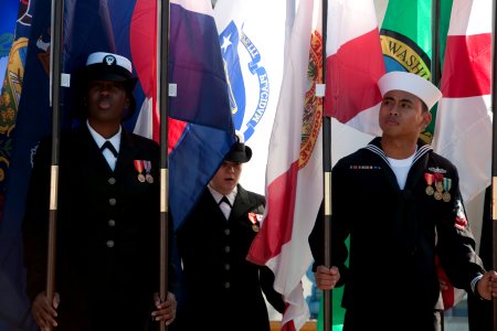 US Navy 101217-N-5758H-004 Sailors stand at ease as flag holders during the change of command ceremony of USS Lassen (DDG 82)