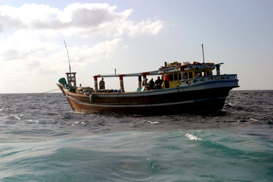 US Navy 040101-N-2295R-002 Boarding teams from ESG 1 take a dhow under tow