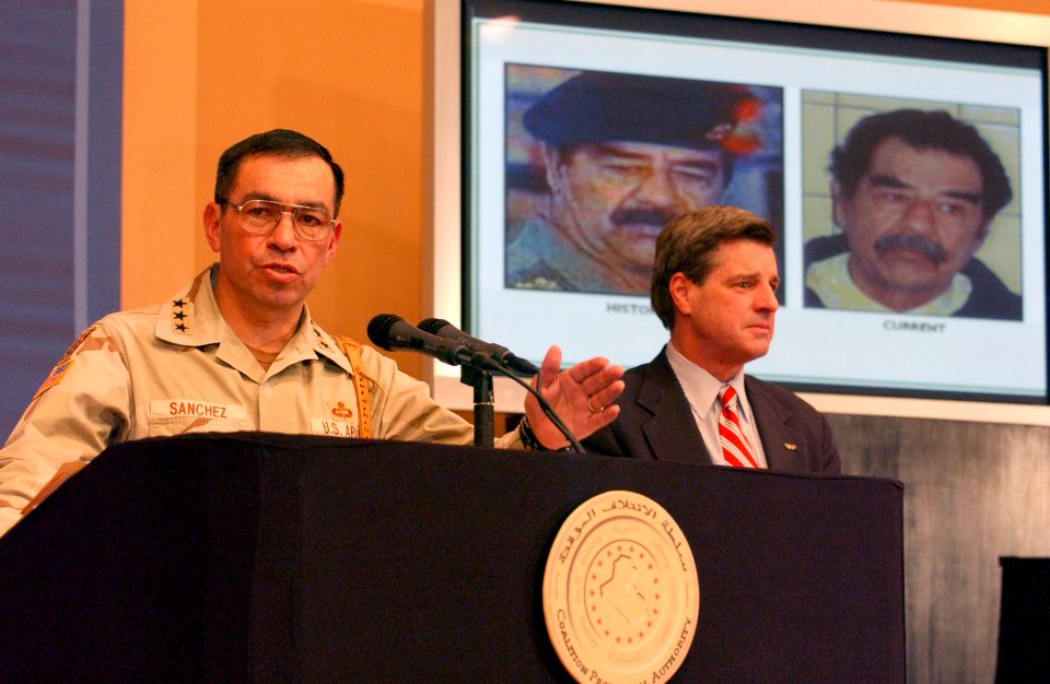 US Navy 031214-F-1093P-005 Lt. Gen. Ricardo Sanchez, Commander, Joint Task Force Seven, and Ambassador L. Paul Bremmer, Coalition Provisional Authority Administrator
