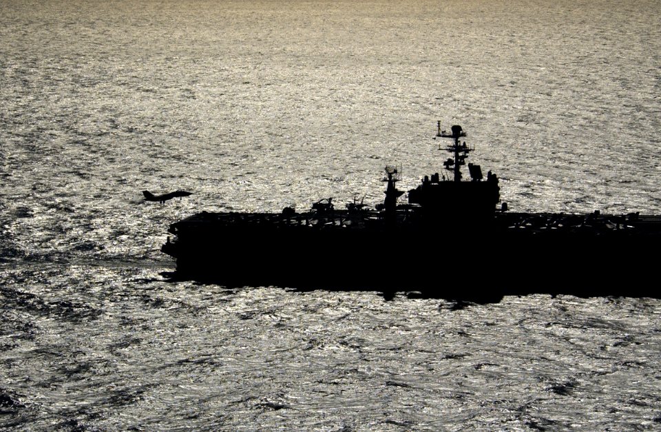 US Navy 040122-N-5319A-006 An F-14 Tomcat assigned to the Pukin Dogs of Fighter Squadron One Four Three (VF-143) prepares to land on the flight deck