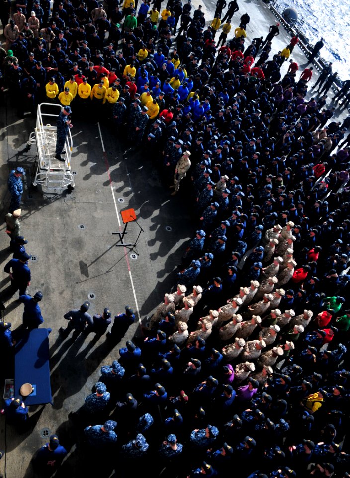 US Navy 110506-N-ZS026-235 Capt. Frank Michael addresses the crew and embarked personnel during an all-hands call aboard USS Boxer (LHD 4)