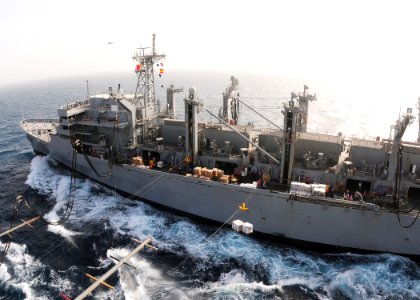 US Navy 110519-N-SG869-704 Fuel and supplies are transferred from the Military Sealift Command fast combat support ship USNS Bridge (T-AOE 10) to t