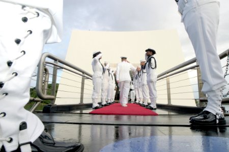 US Navy 031207-N-3228G-007 Sideboys render honors to the official party