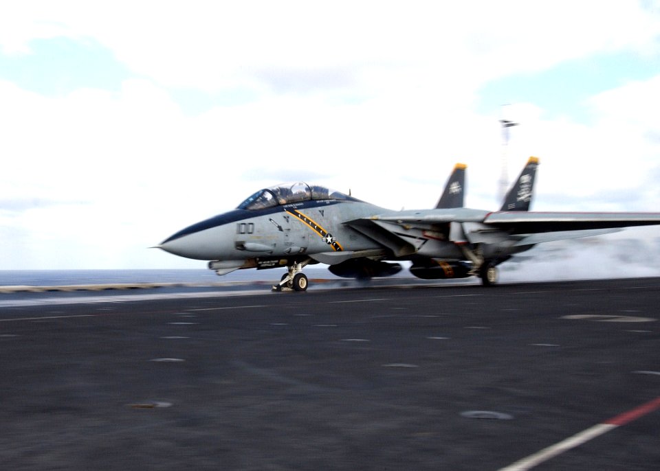 US Navy 040226-N-4374S-005 An F-14B Tomcat assigned to the Jolly Rogers of Fighter Squadron One Zero Three (VF-103) launches from the number one catapult during the flight operations aboard John F. Kennedy (CV 67)