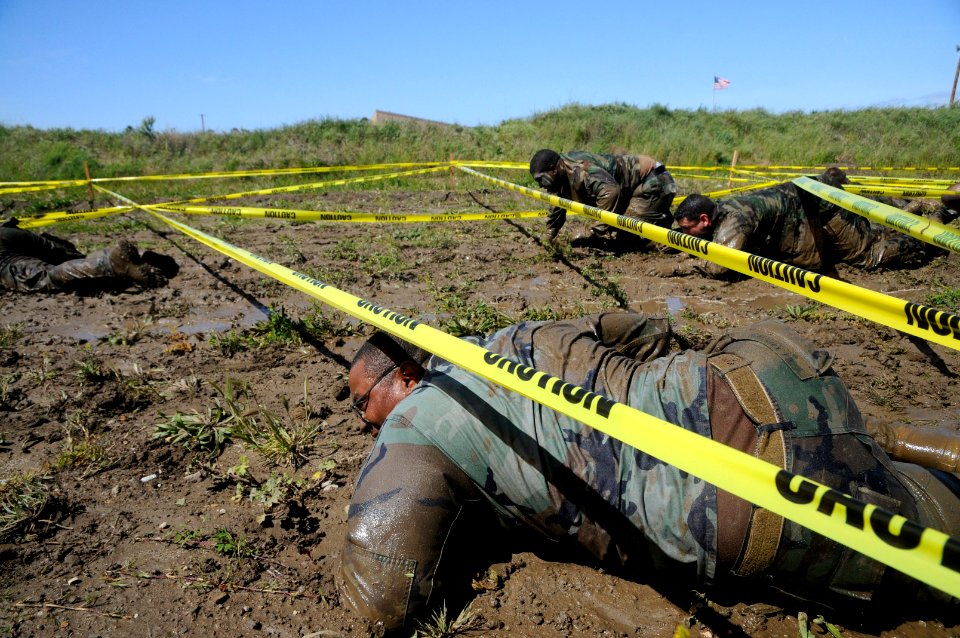 US Navy 110325-N-SI773-795 Sailors low-crawl during the 2nd annual Vietnam-6 Memorial Super Squad competition