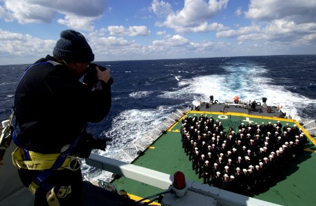 US Navy 040214-N-5319A-003 Canadian Navy, Master Corporal Christopher Kelly photographs the crew of the Canadian Navy Halifax-class patrol frigate, HMCS Toronto (FFH 333) on Valentine's Day photo