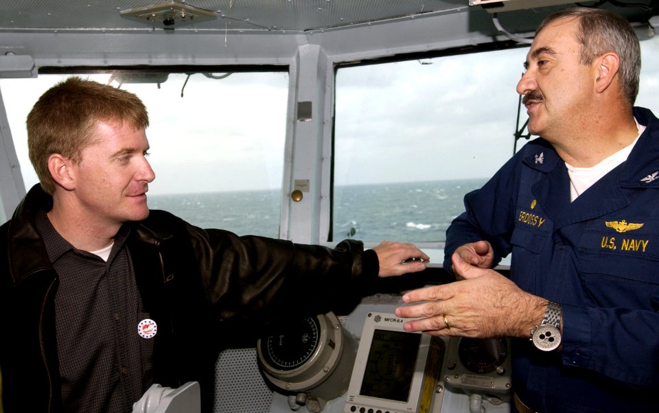 US Navy 031210-N-5319A-007 NASCAR driver Jeff Burton talks with Captain Martin J. Erdossy, Commanding Officer, USS George Washington (CVN 73) on the flag bridge, during a visit aboard the aircraft carrier