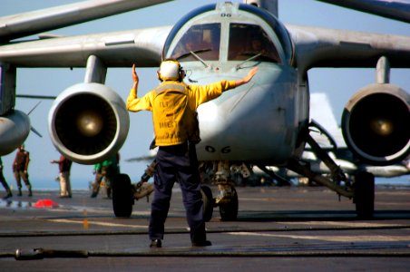 US Navy 040304-N-6278K-128 Aviation Boatswain's Mate 3rd Class Joseph Lupo, of Parrot, Ga., directs an S-3B Viking assigned to the Topcats of Sea Control Squadron Three One (VS-31) on the flight deck aboard