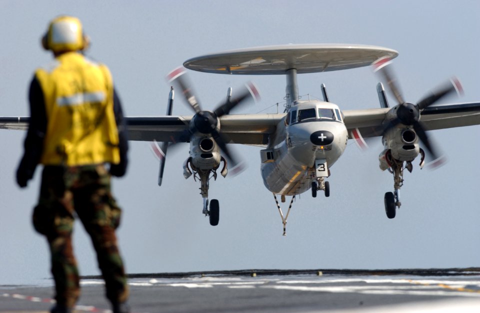 US Navy 040219-N-5821P-005 An E-2C Hawkeye makes an arrested landing aboard the aircraft carrier USS Kitty Hawk (CV 63)