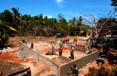 US Navy 040219-N-4142G-003 Naval Mobile Construction Battalion Two Five (NMCB 25), along with members of the Armed Forces of the Philippines (AFP) work on a building at the Manuel Memorial Elementary School
