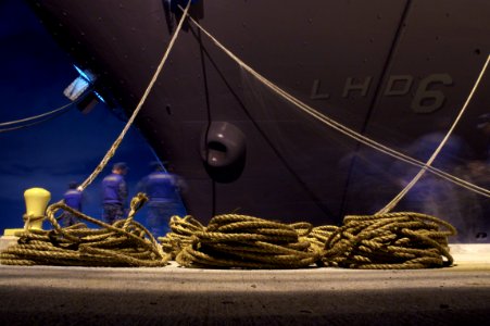 US Navy 110413-N-ZC343-514 Sailors tie USS Bonhomme Richard (LHD 6) to the pier after transiting from NASSCO dry dock to Naval Base San Diego