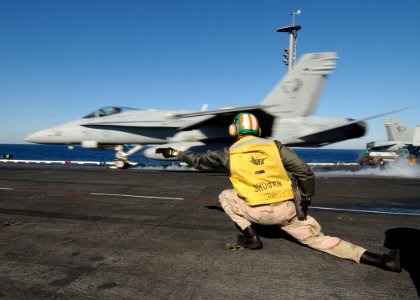 US Navy 040219-N-4374S-010 An F-A-18 Hornet launches from one of four steam powered catapults aboard USS John F. Kennedy (CV 67)