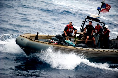 US Navy 110820-N-PB383-185 Sailors recover suspected drugs from a vessel off the San Diego coast