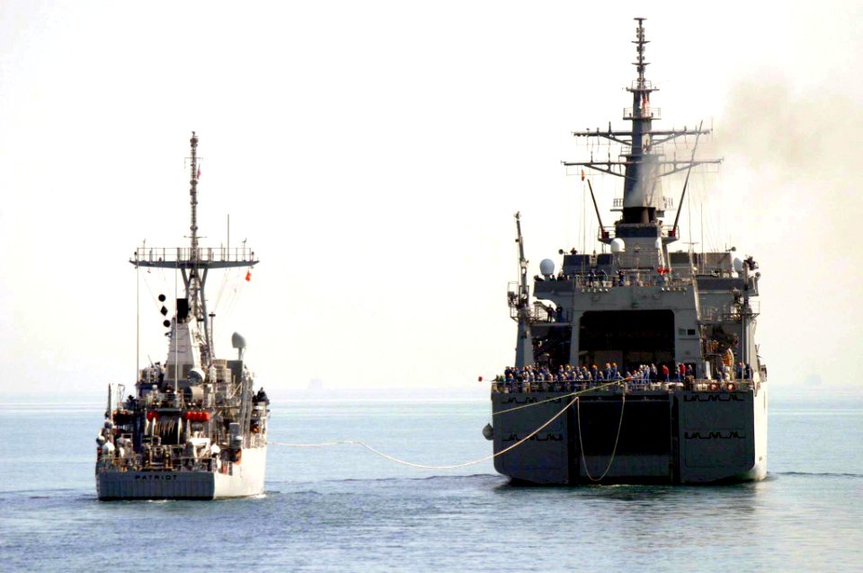 US Navy 040220-N-0000W-001 The mine countermeasures ship USS Patriot (MCM 7) completes fuel connections while preparing to take on fuel from the Japanese minesweeper tender JDS Bungo (MST 464) during an underway replenishment (