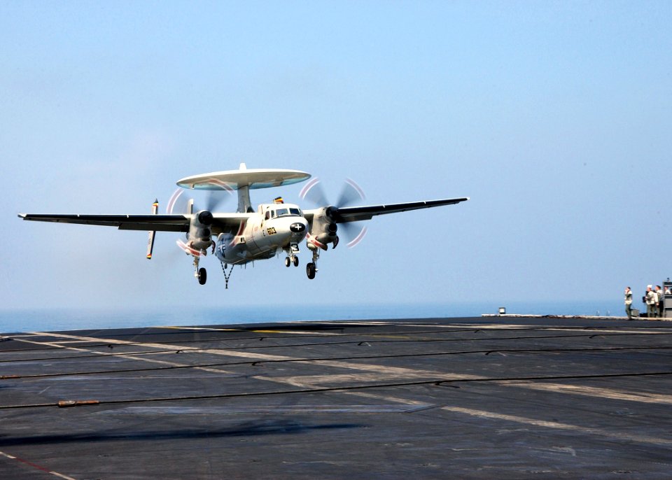 US Navy 040306-N-4374S-015 An E-2C Hawkeye makes its final approach to the aircraft carrier John F. Kennedy (CV 67) after completing a training mission