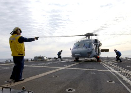 US Navy 040309-N-4374S-009 An MH-60S Knighthawk assigned to the Dragon Whales of Helicopter Combat Support Squadron Eight (HC-8) prepares to launch from the flight deck aboard the guided missile frigate Taylor (FFG 50)