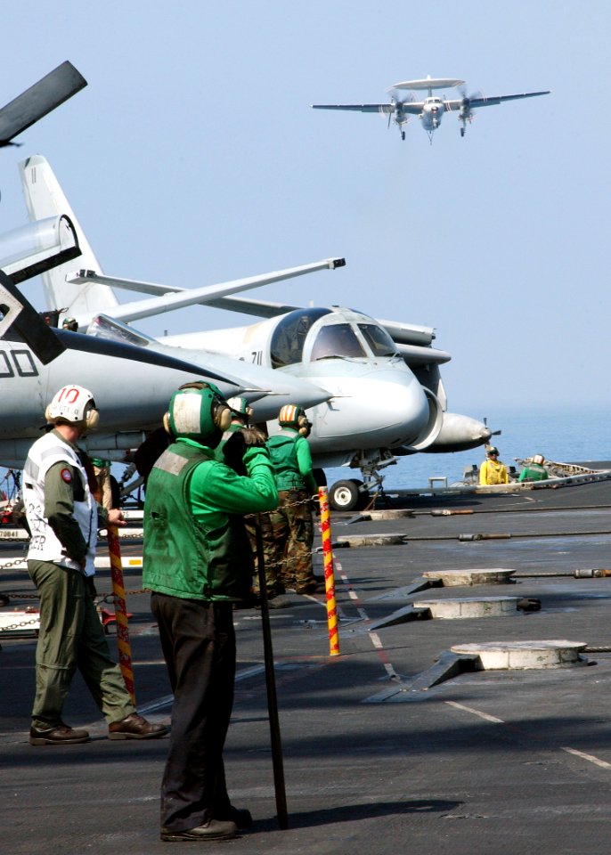 US Navy 040306-N-4374S-014 An E-2C Hawkeye makes its final approach to the aircraft carrier John F. Kennedy (CV 67) after completing a training mission