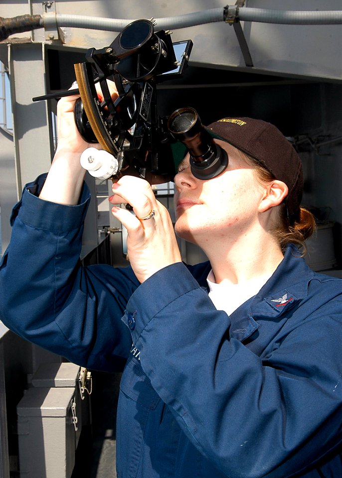US Navy 040326-N-3986D-024 Quartermaster 3rd Class Mamie Anne Randall, of Paris, Ill., uses a sextant aboard USS George Washington (CVN 73)
