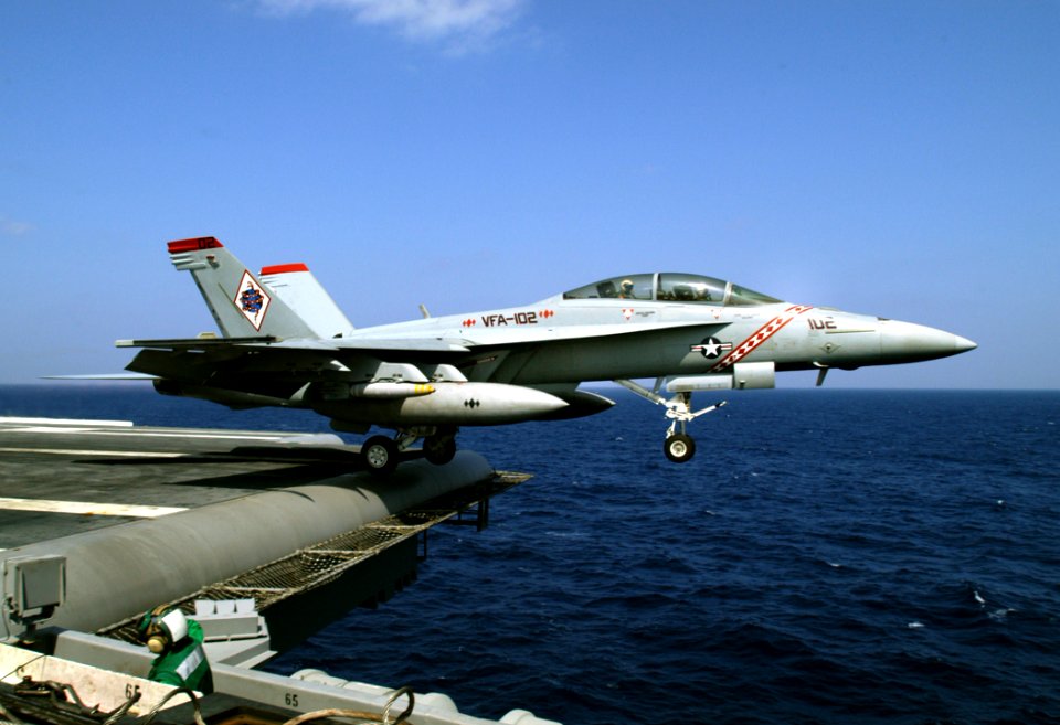 US Navy 040228-N-5821P-010 A F-A-18F Super Hornet assigned to the Diamondbacks of Strike Fighter Squadron One Zero Two (VFA-102), launches from one of four steam powered catapults aboard USS Kitty Hawk (CV 63)