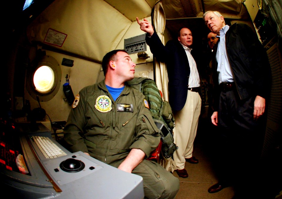 US Navy 040416-N-5821W-005 Aviation Warfare Systems Operator 2nd Class Justin Donohue shows Alabama Senator Jeff Sessions a sensor station inside one of the squadron's P-3C Orion aircraft